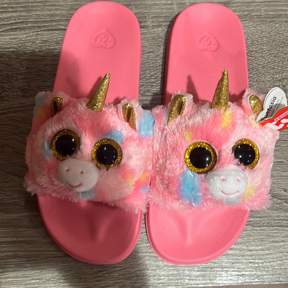 The brand name is the TY Fashioned Collection Color : Yellow Slippers